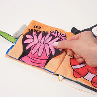 Montessori stoffen babyboek Montessori & Speelgoed